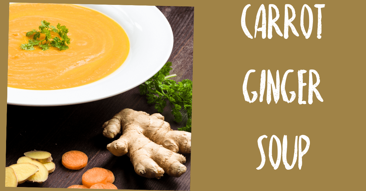 carrot ginger soup with fresh carrots and ginger in a white bowl on a dark wood table